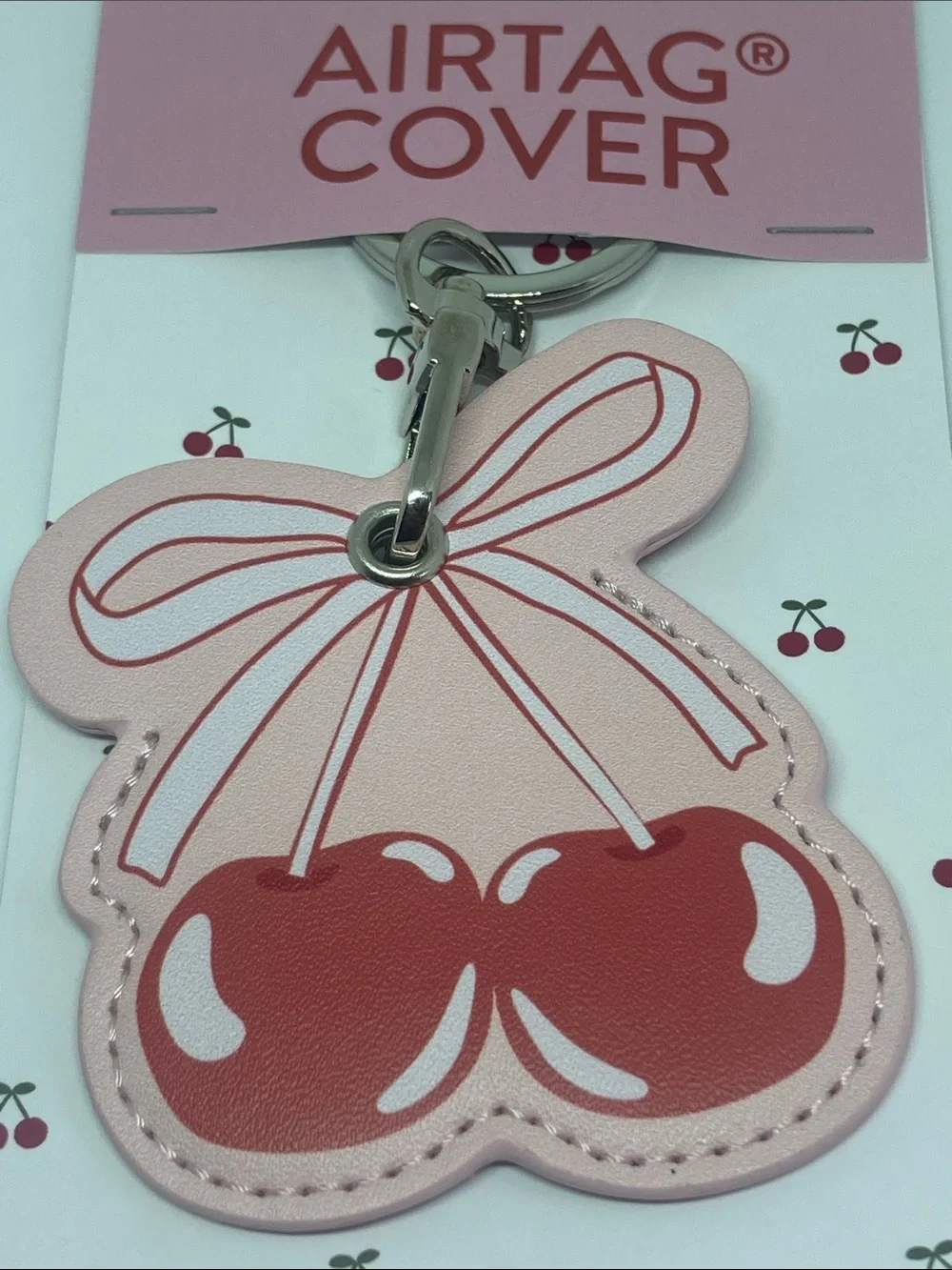 Tilly's Pink Cherry Airtag Cover Keychain